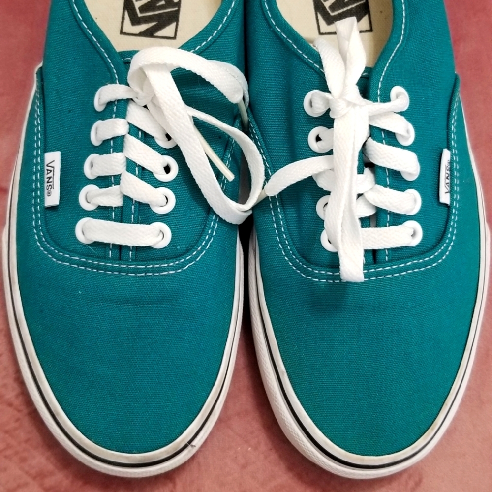 Van's teal sneakers